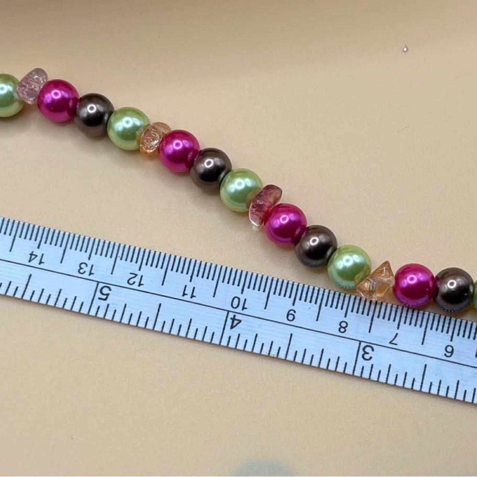 Handmade Pink, Green & Brown Beaded Bracelet with “Handmade” Charm